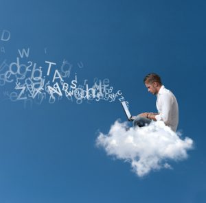 Businessman works over a cloud